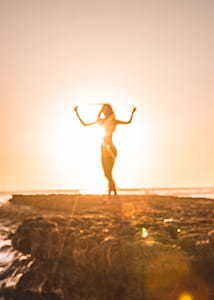 Silhouette of Woman Near Cliff thumbnail