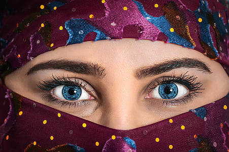 woman wearing brown and multicolored hijab thumbnail