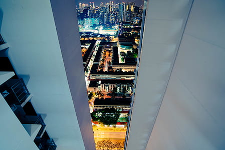 aerial photography of city buildings at night time thumbnail