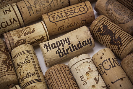 brown bottle cork lot on table\ thumbnail