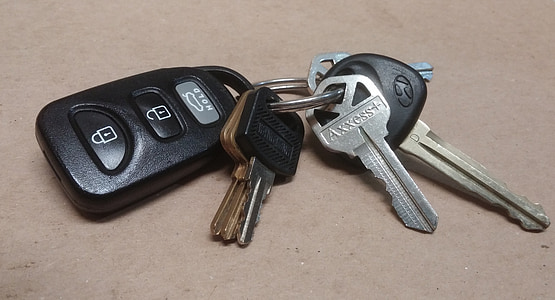 black key fob and silver keys thumbnail