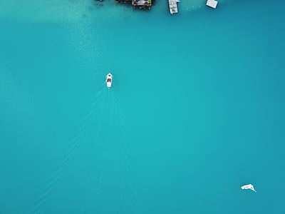 aerial photo of yacht on body of water thumbnail