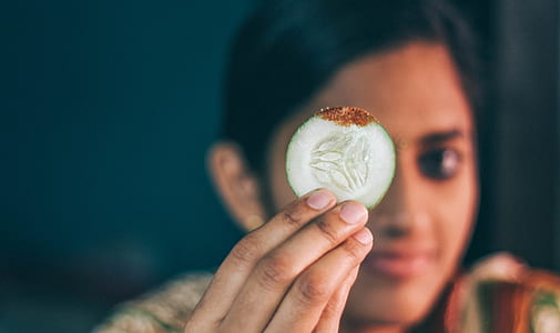 person holding cucumber thumbnail