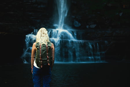 woman looking at waterfall thumbnail