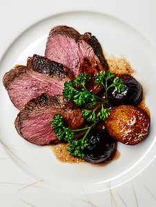 medium rare grilled beef on plate thumbnail