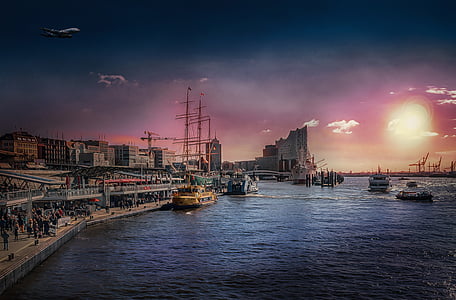 sail ships near buildings during golden hours thumbnail