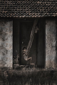 photo of boy swinging on hammock thumbnail