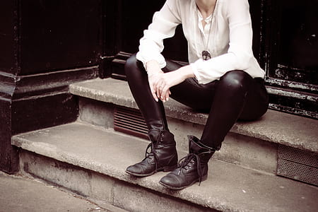 man sitting on concrete 2-step stair set thumbnail