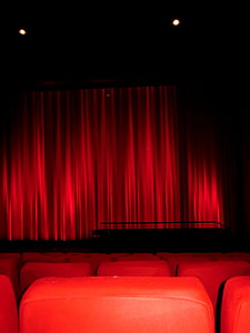 red chair in front of stage thumbnail