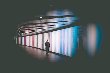 person walking in tunnel thumbnail