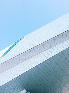 white painted building under blue sky thumbnail