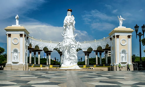 woman carrying child statue thumbnail