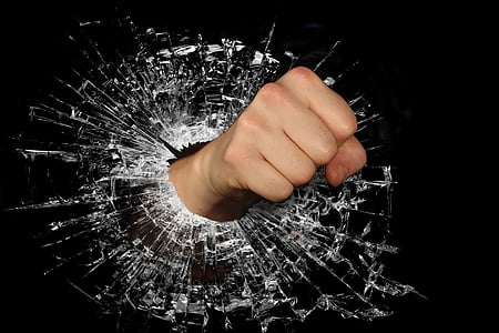 hand punching on glass thumbnail