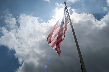 red and blue flag on gray pole thumbnail