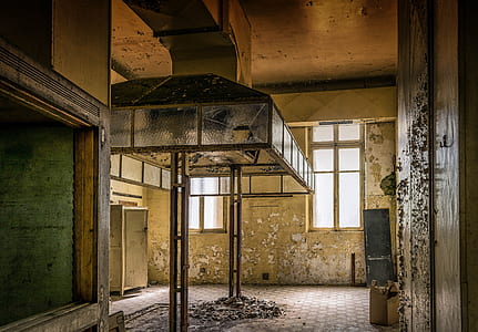 gray metal range hood inside abandoned building thumbnail