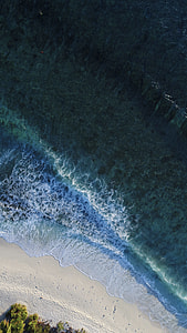 aerial photo of seashore during daytime thumbnail