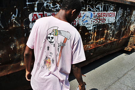person wearing pink crew-neck top thumbnail