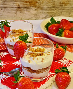 nuts with cream and strawberry inside shot glass thumbnail