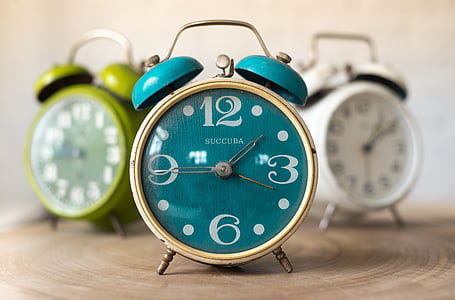 three assorted-color twin bell alarm clocks thumbnail