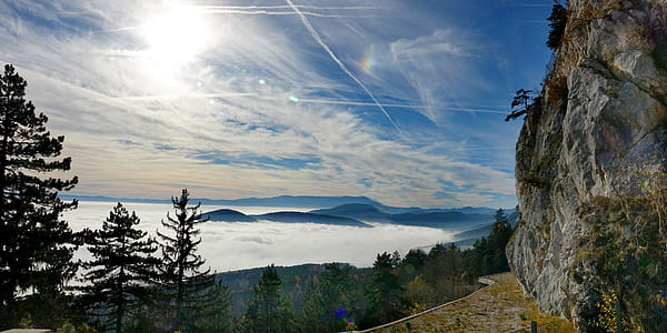 mountain covered with clouds at daytime thumbnail