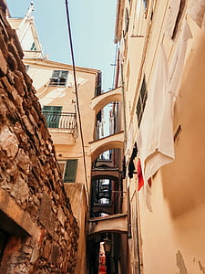 pathway between concrete buildings thumbnail