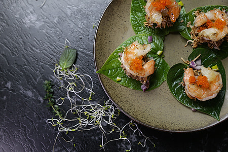 four dishes on leaves thumbnail