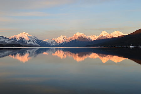mountain range with snow and lake panoramic view thumbnail