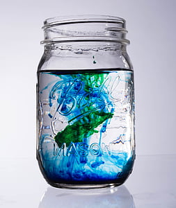 water in Mason jar with blue and green color liquid thumbnail