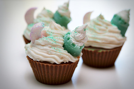 three cupcakes with icing toppings thumbnail