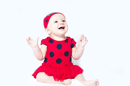 baby in red and black polka-dot shirt dress thumbnail