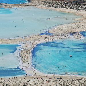 aerial photograph of people in beach thumbnail