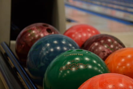 bokeh shot of bowling balls thumbnail