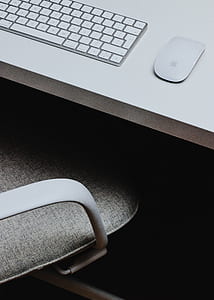 Apple Magic Mouse and Keyboard on table thumbnail