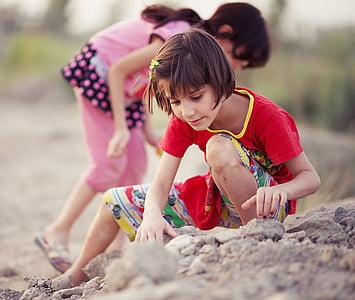 girl sitting on ground thumbnail