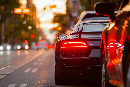 black vehicle on road thumbnail