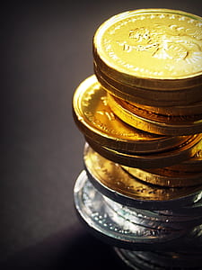 stack of gold and silver chocolate coins thumbnail