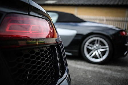 low light photography of black car thumbnail