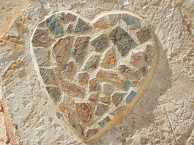 photography of brown stone heart embossed thumbnail