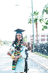 woman holding champagne bottle thumbnail