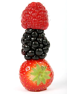 three berries stacked against white background thumbnail