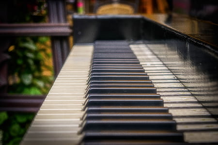 closed-up photo of black piano thumbnail