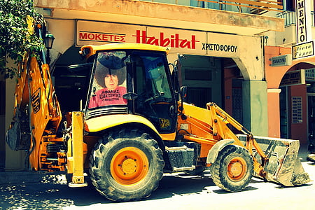 yellow and black backhoe thumbnail