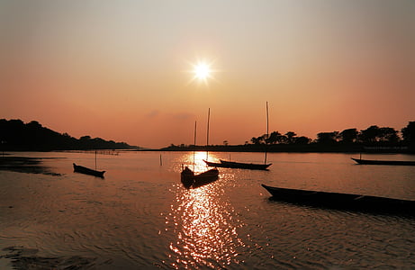boat on body of water during sunset thumbnail