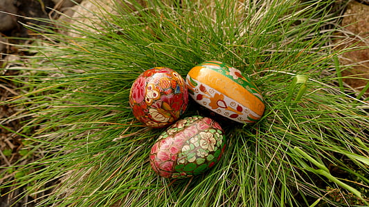 three egg decor on green grass thumbnail