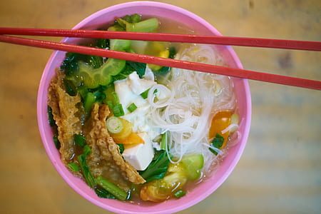 noodle soup served on pink bowl thumbnail