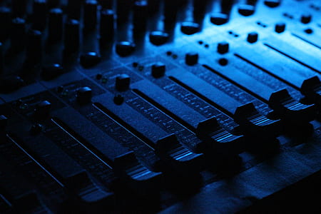 low light photography of audio mixer thumbnail