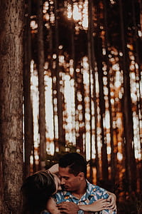 couple under forest bokeh photography thumbnail