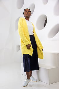 Woman Wearing Yellow Knit Cardigan Standing thumbnail