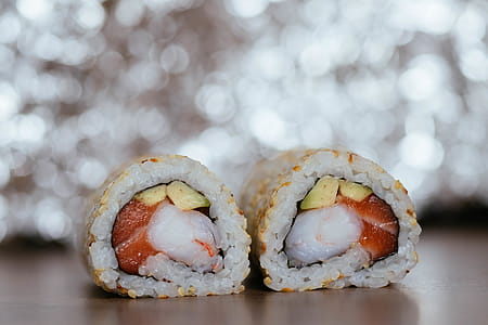 Focus Photography of Cooked Sushi on Brown Wooden Surface thumbnail