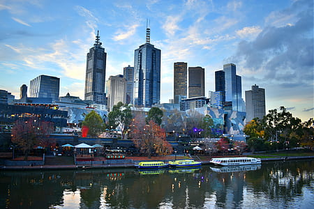 highrise building near body of water thumbnail